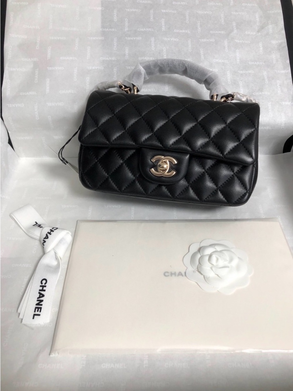 CHANEL Black Quilted Leather Shoulder Bag with Top Handle